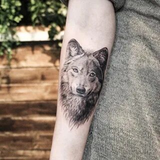 Значение татуировки волчица для девушки