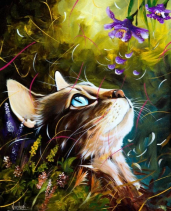Кот в саду