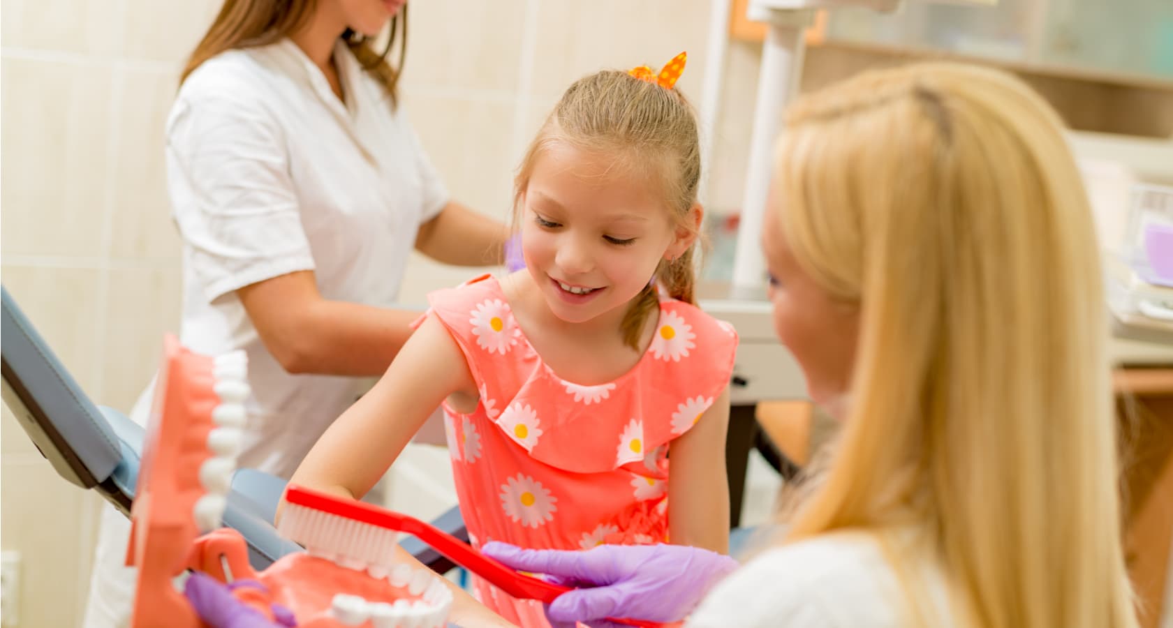 Smiling family dentist hero image