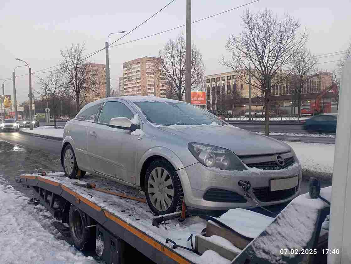 Эвакуация автомобиля Opel Astra с Пискаревского проспекта  в Калининском районе Санкт-Петербурга