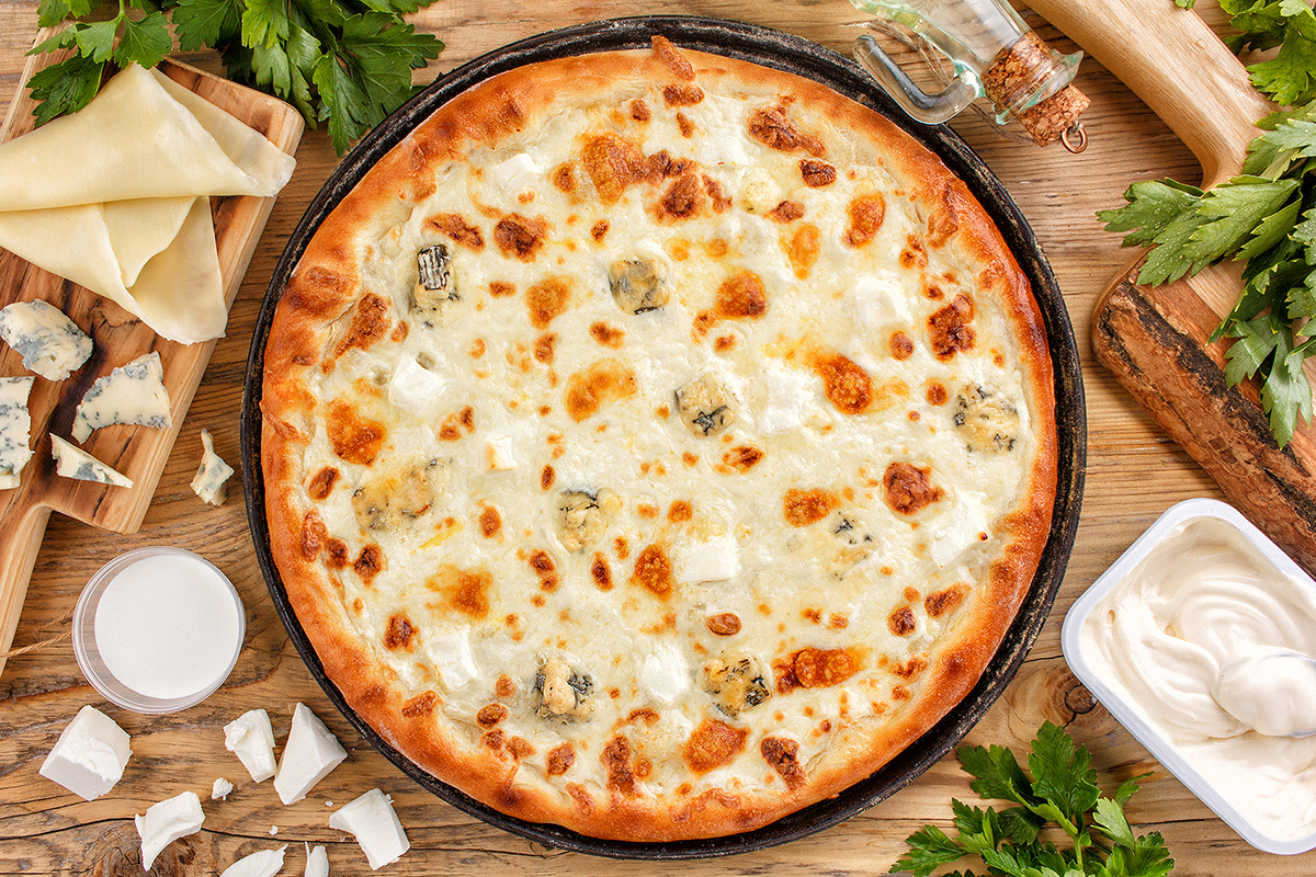 сколько калорий в одном куске пиццы четыре сыра фото 66