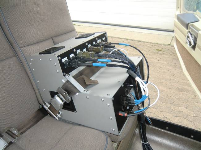 Figure 4 – ALMA G2 D-Box Secured to Backseat with Seatbelt