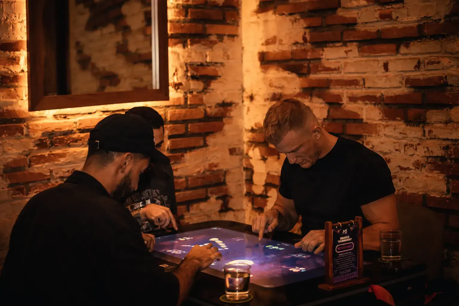 The interactive digital game tables are a unique feature of Eden Hookah Club, bringing high-tech entertainment to Bali's shisha scene.