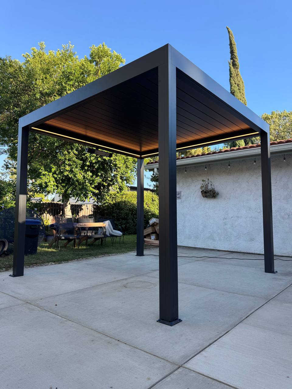 Costa Mesa motorized pergola with closed louvers and integrated perimeter LED lighting