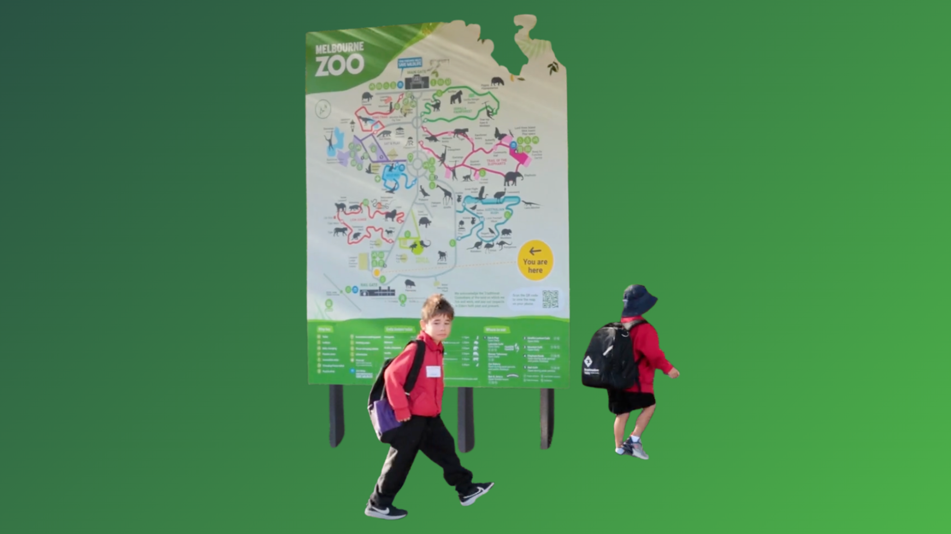 Children walking into a zoo