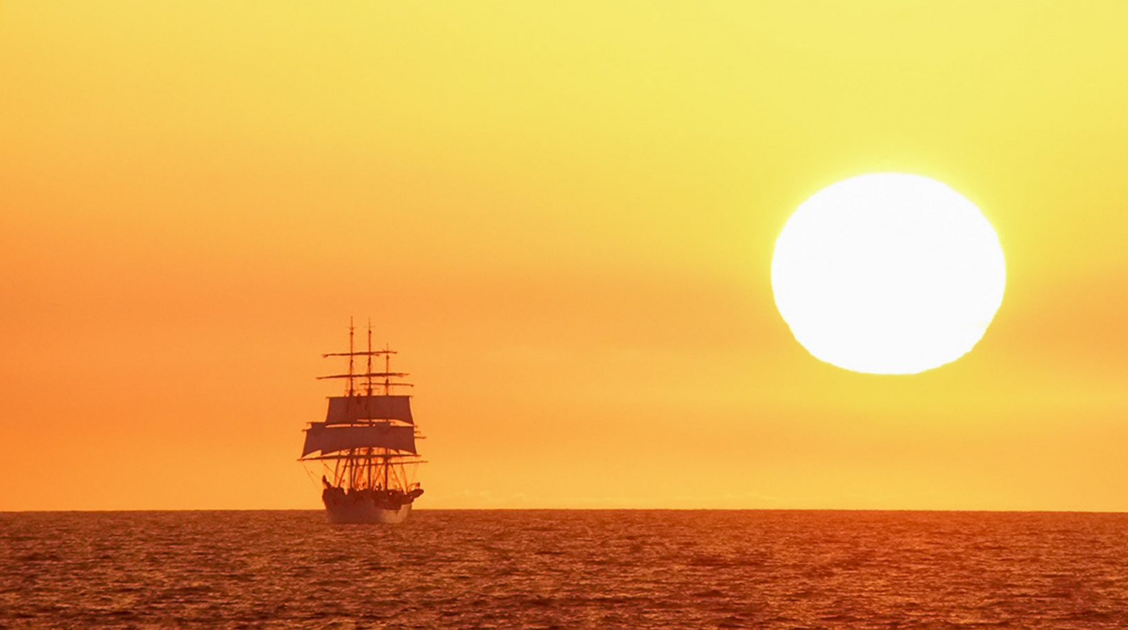 Sailing ship in Atlantic ocean, Sunset, Tall ships races. Photo by Elena Mashkova