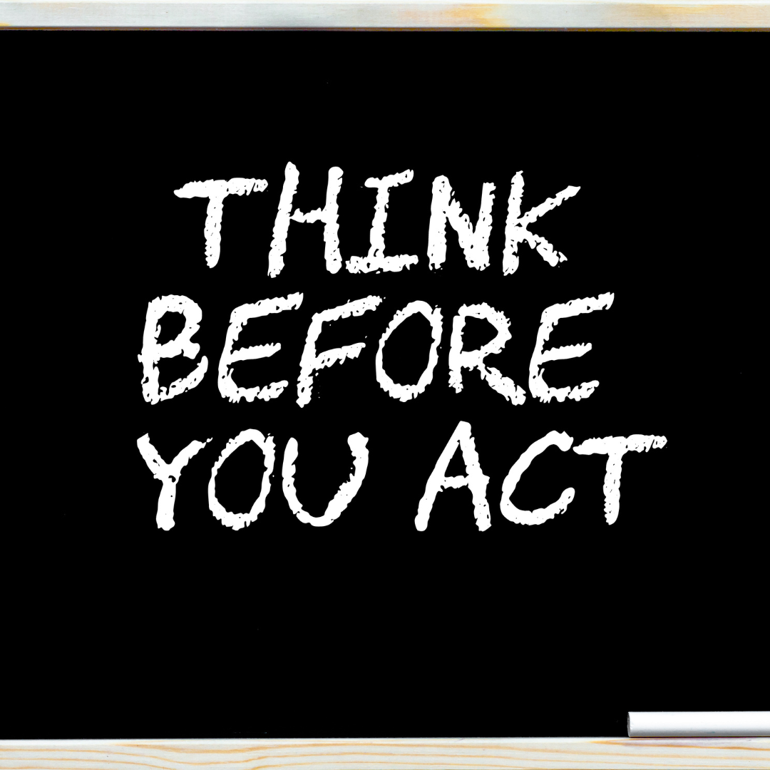 black card stock with think before you act on it in white
