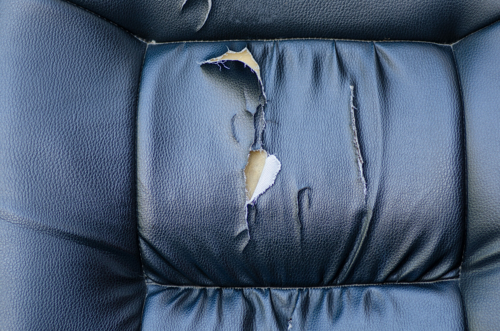 Torn car Seat