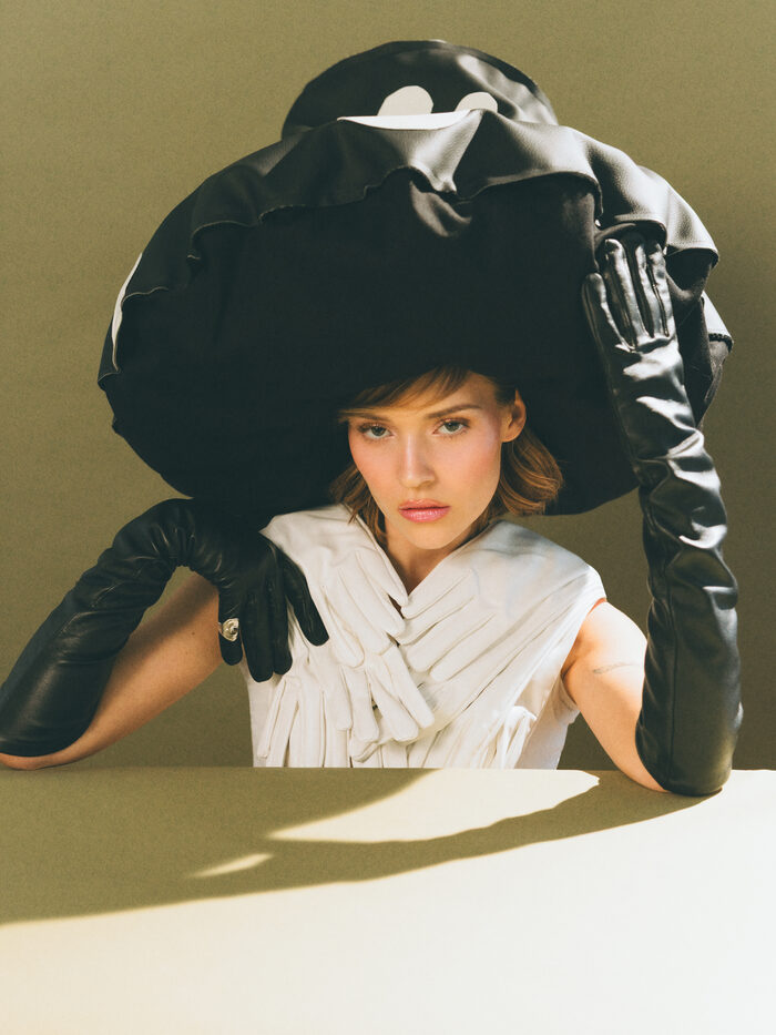 Artells Magazine fashion editorial portrait with sculptural black styling