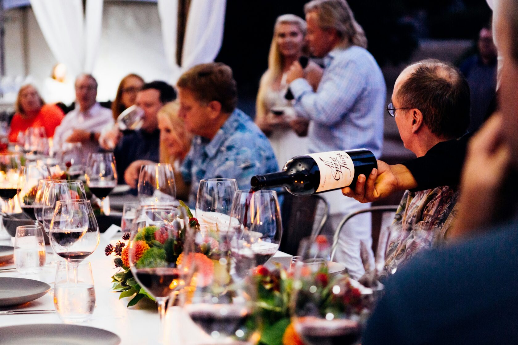 Human hospitality moments: sommelier, hotel welcome, restaurant service
