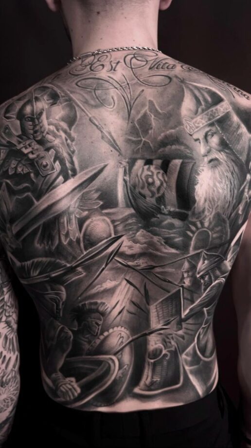 Тату в стиле биомеханика на спине — фото татуировок года
