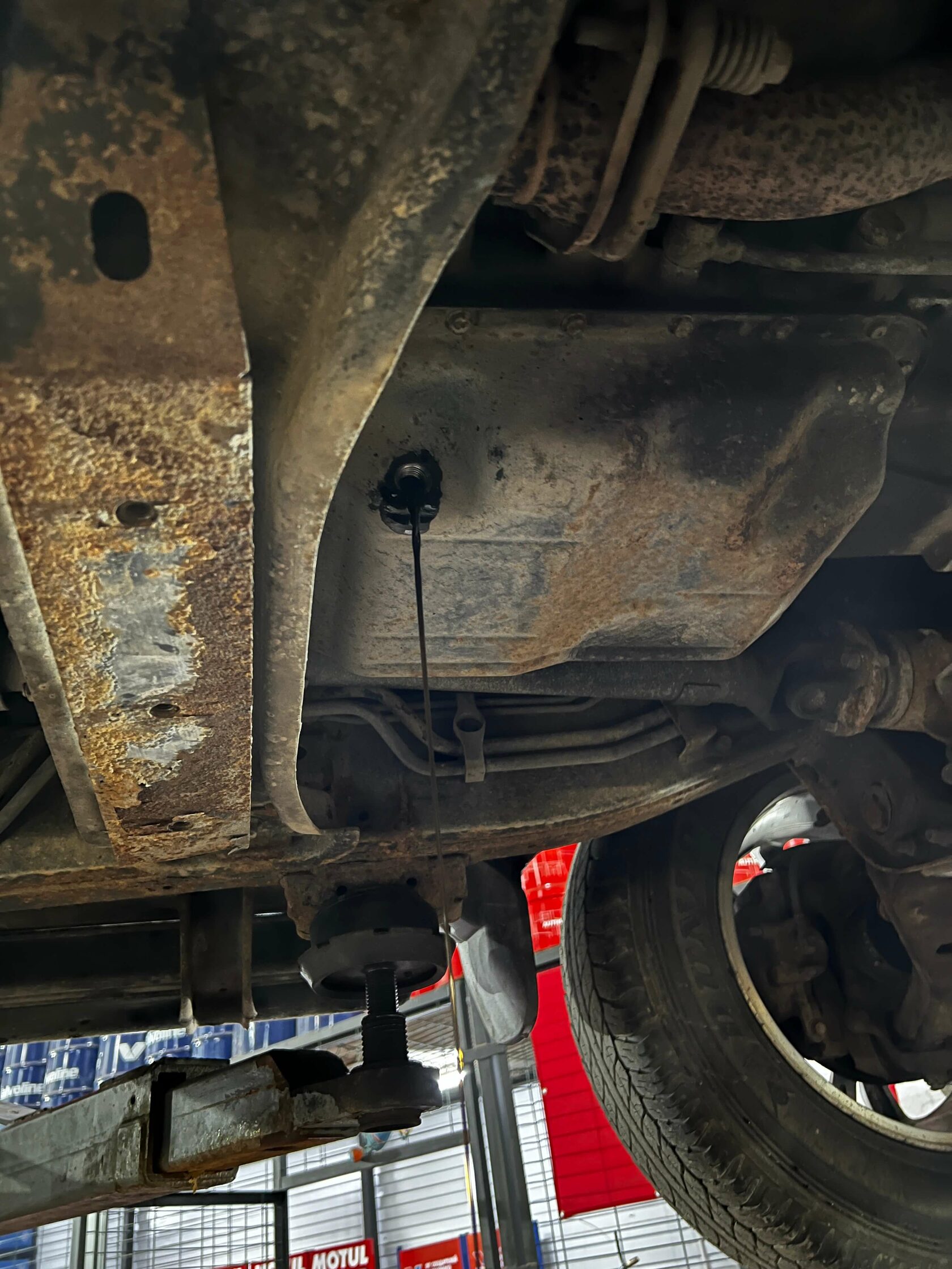 Слив масла из картера АКПП