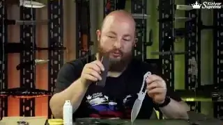Careful hand polishing of a knife blade with leather