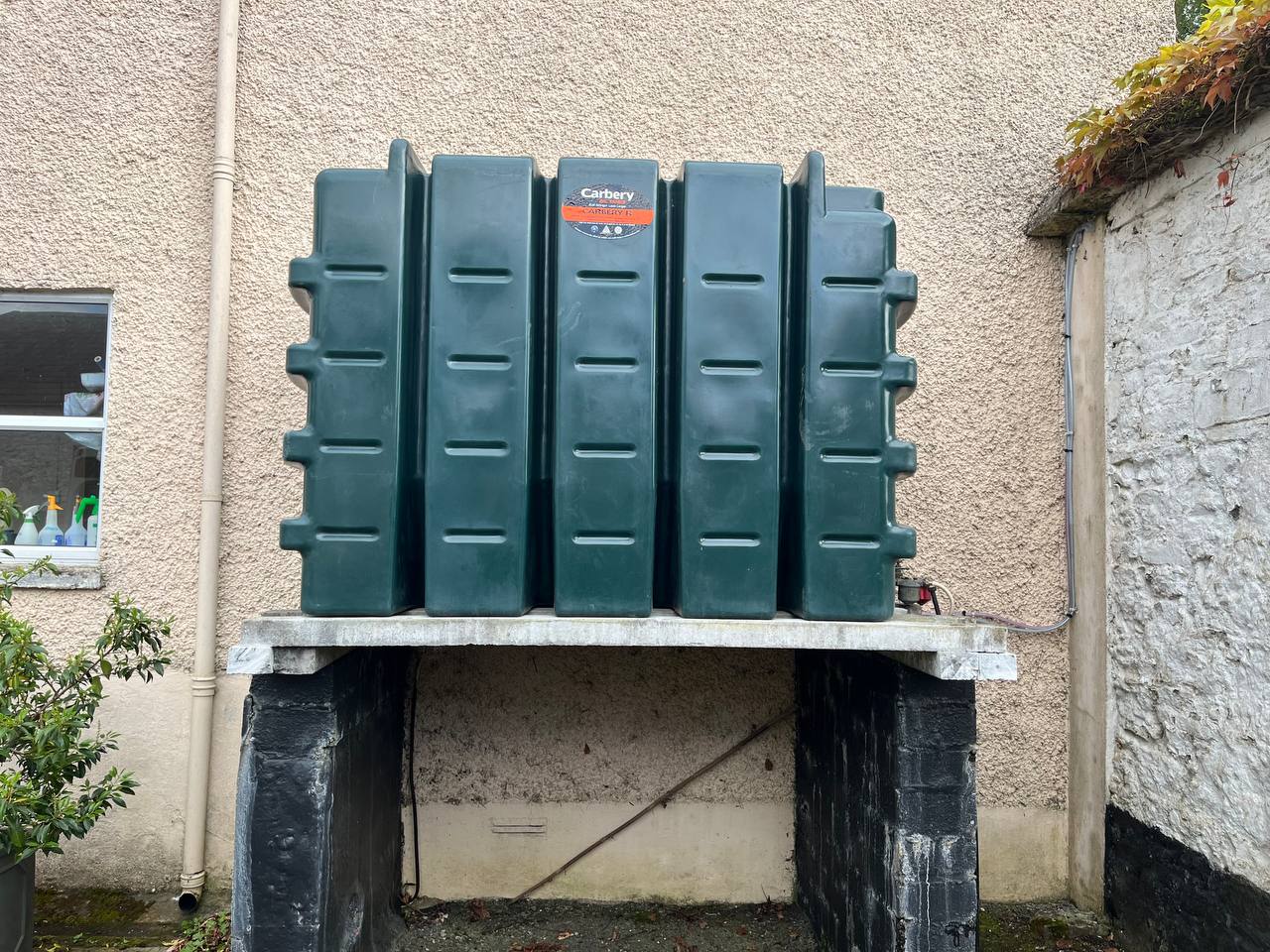 New oil tank installed close to house