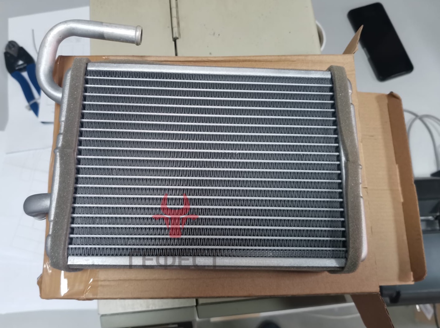 Радиатор отопителя (печки) в экскаватор