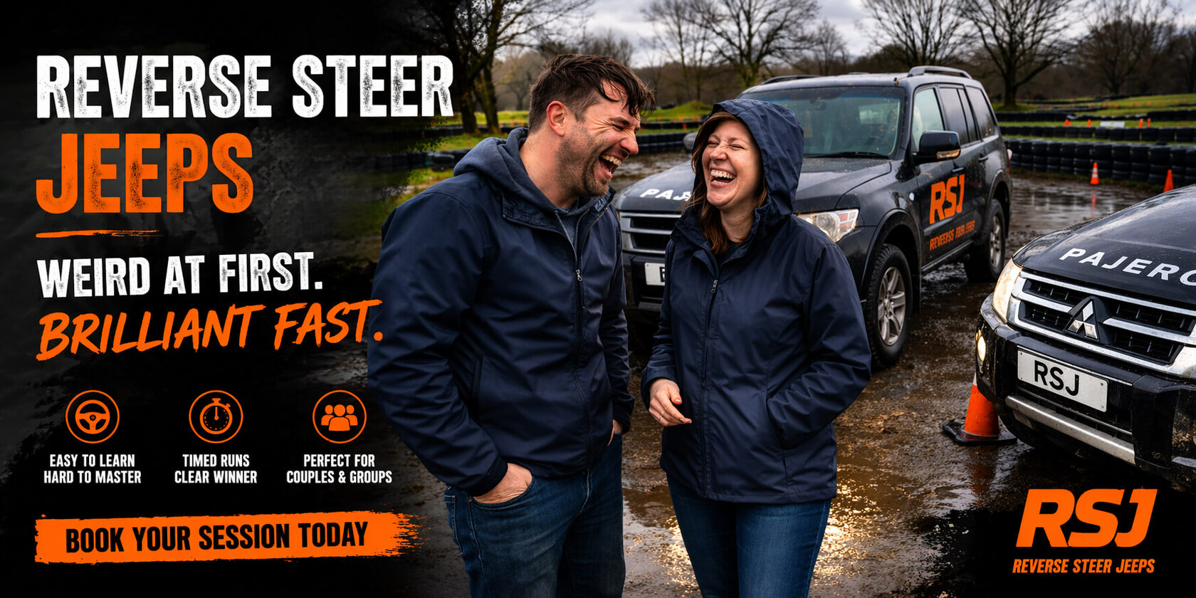 Two adults laughing beside a muddy reverse steer jeep on a wet Irish track with tyre barriers and cones