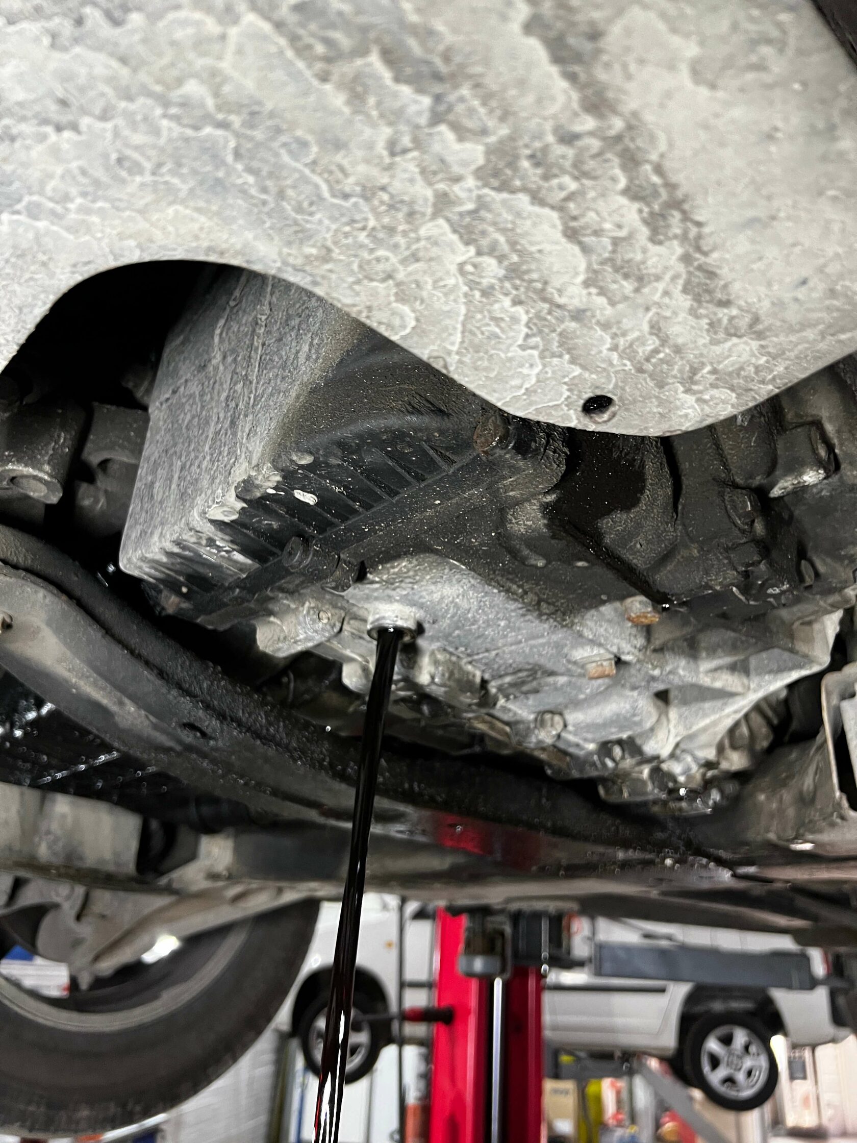 Слив масла из передней секции коробки