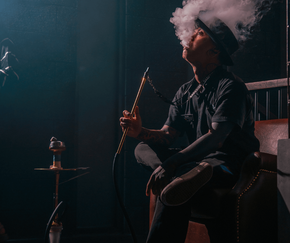 Hookah beside a man with black suits