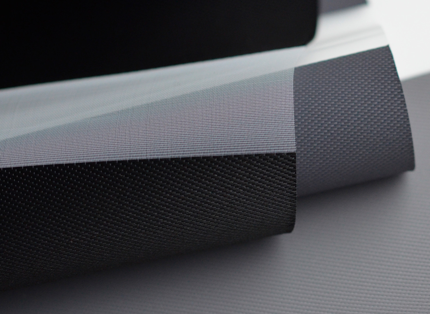 ткань для штор день-ночь рулоном свернута, цвет темно-серый