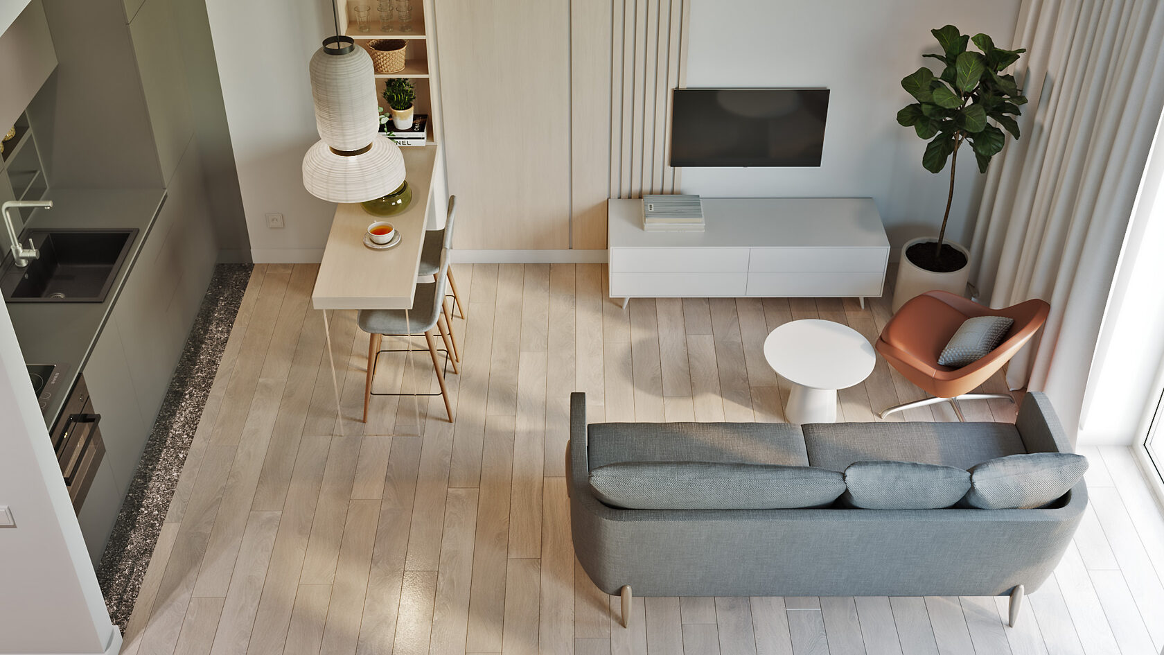 agencement d’un studio avec coin salon et cuisine ouverte vue en plan