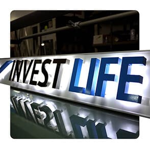 Вывеска Invest Live с контражурной подсветкой