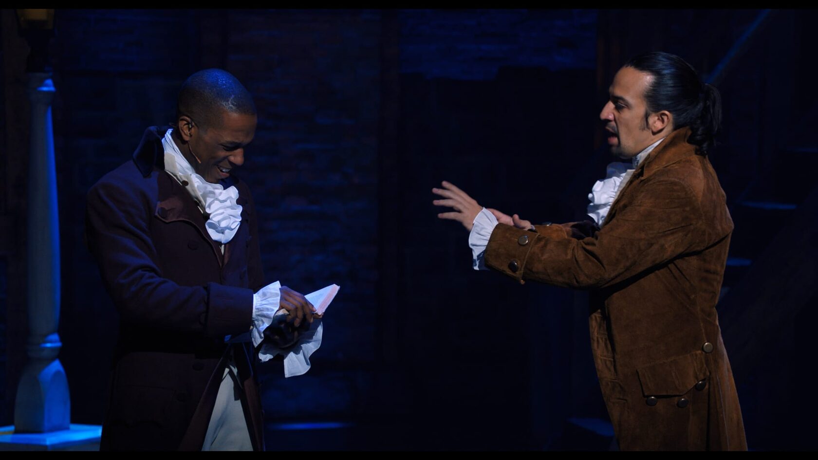 Hamilton - Alexander Hamilton talks to Aaron Burr on stage.