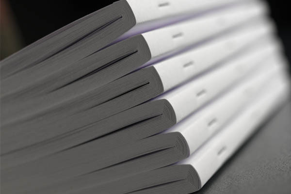 Шитье книжных изделий на проволоку.