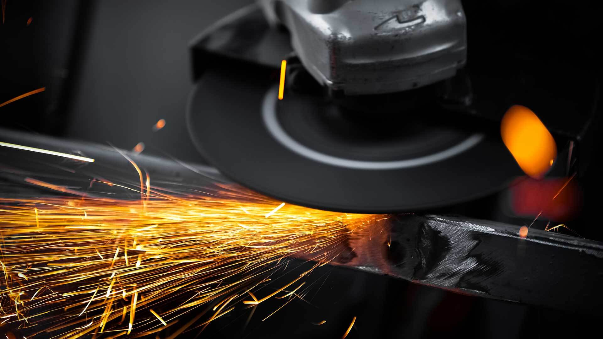 Electric steel. Обработка металла. Завод металлообработки. Резка металлопроката. Искры металла.