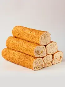 Рулет с фундучным кремом и миндалём в кунжуте — рулеты