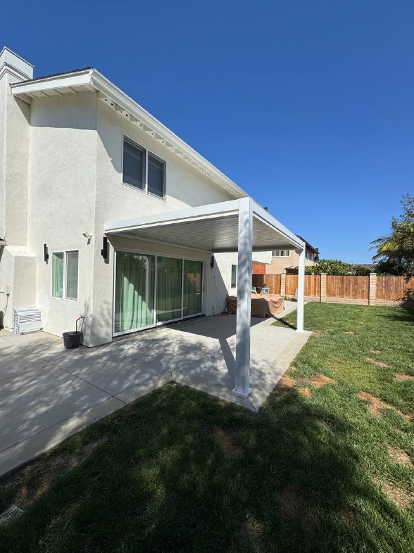 Completed motorized louvered pergola over Huntington Beach patio