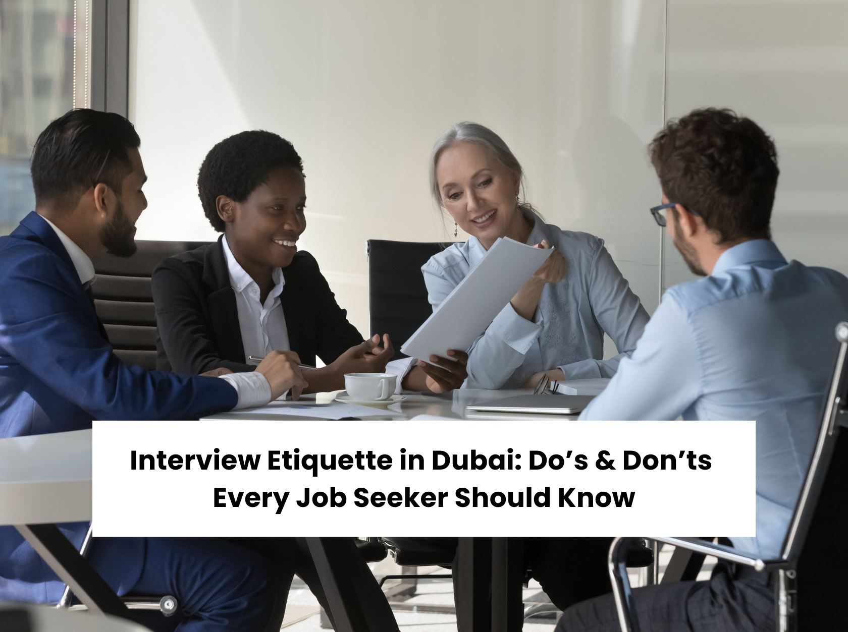 Job interview in Dubai with three interviewers and one candidate, showcasing professional interview etiquette in the UAE.