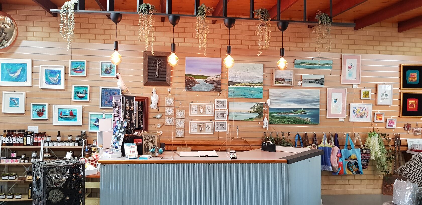 Flukes boutique in Augusta, Western Australia – locally made art, upcycled homewares, artisan jewellery, gourmet treats, and handcrafted gifts displayed in a warm, creative shop setting