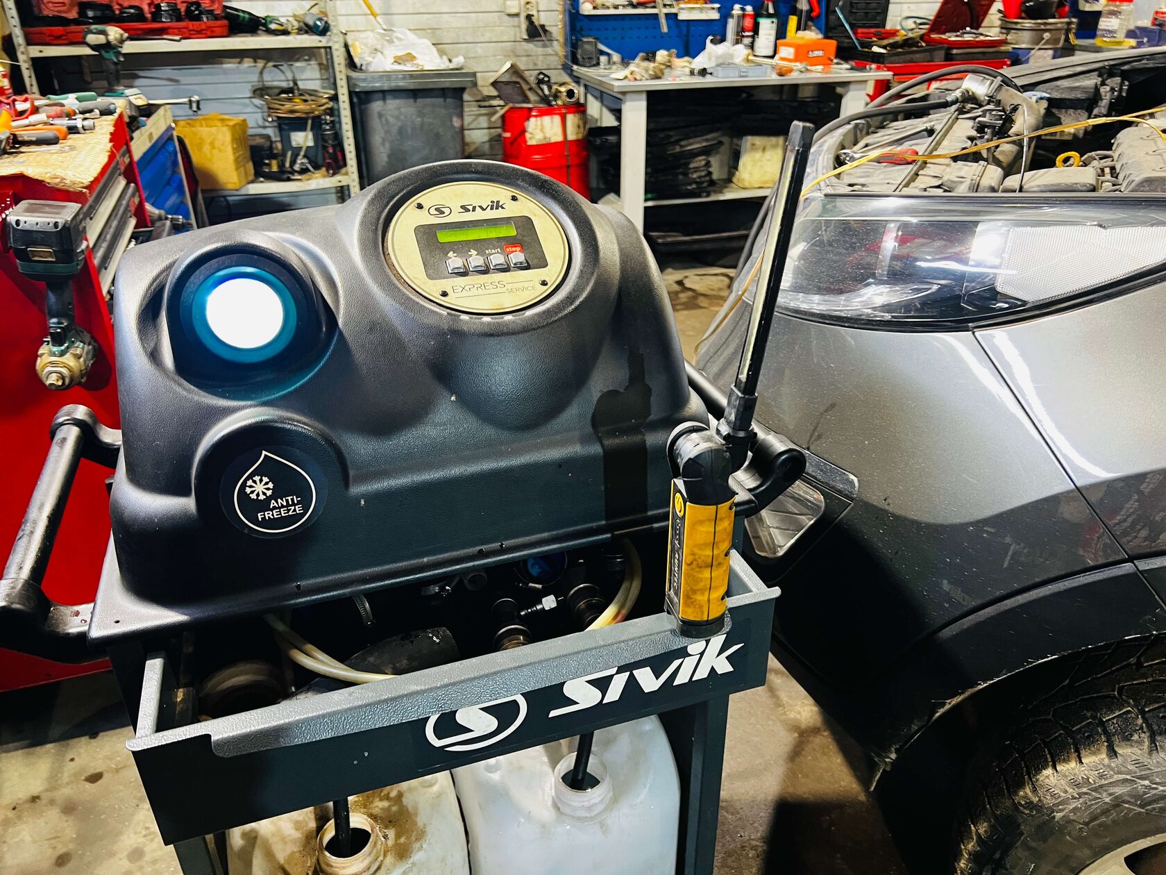 Замена антифриза установкой на Kia Sportage завершена