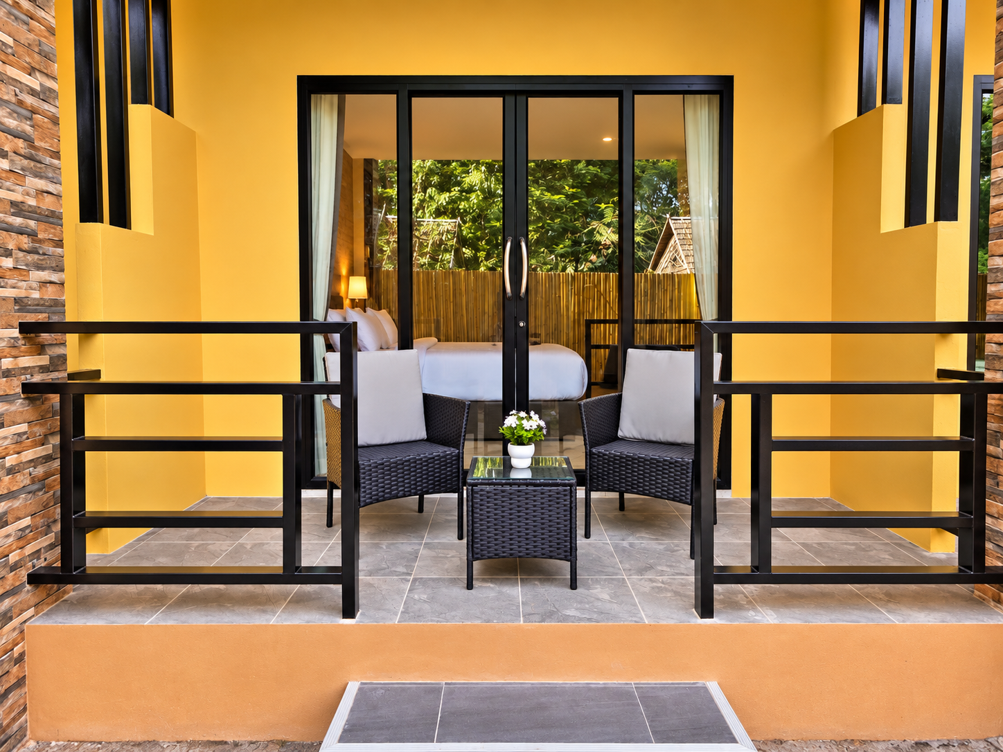 Terrace with rattan seating and flower boxes