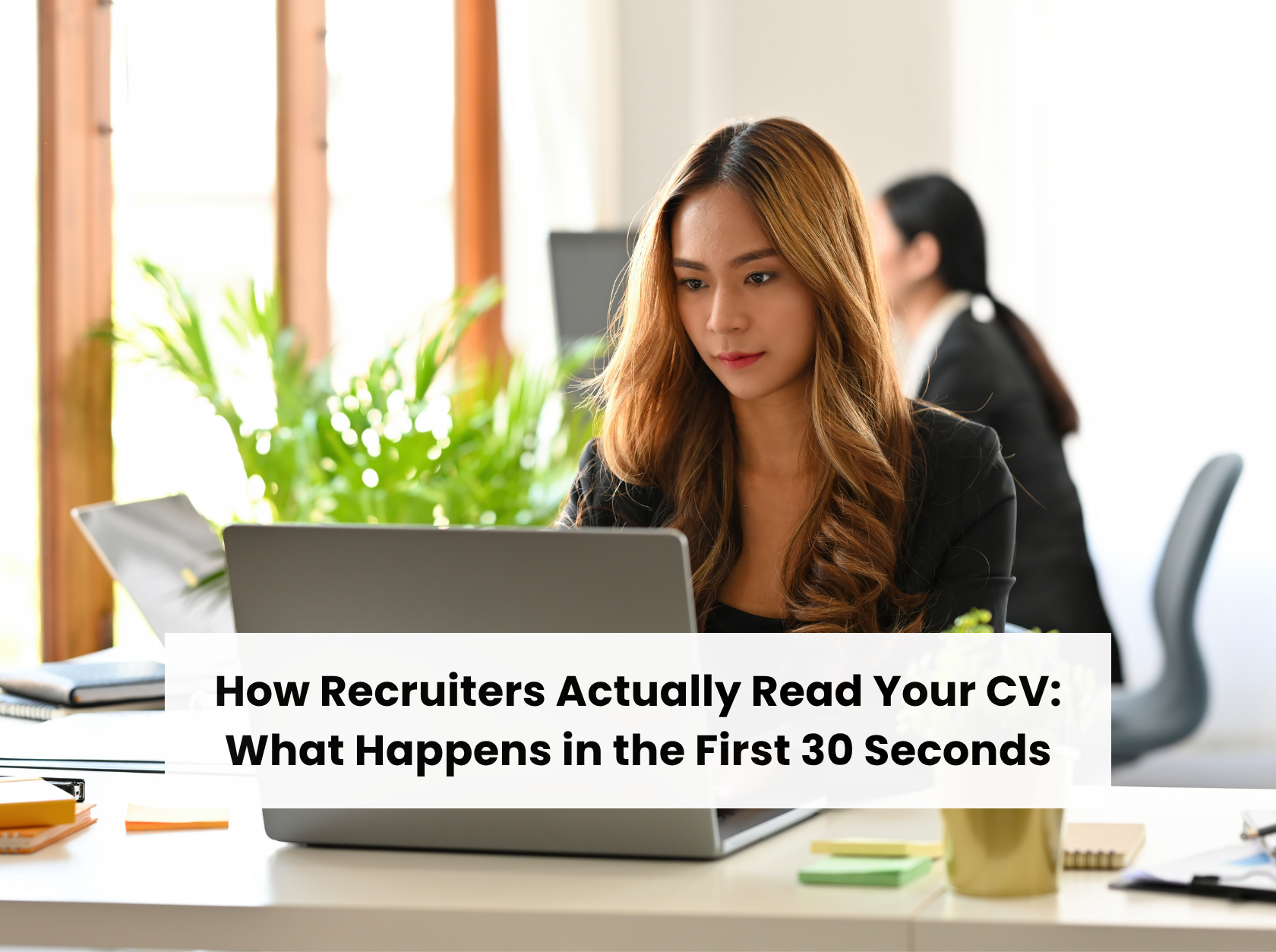 Recruiter reviewing a candidates CV during the first 30 seconds of resume screening and shortlisting process.