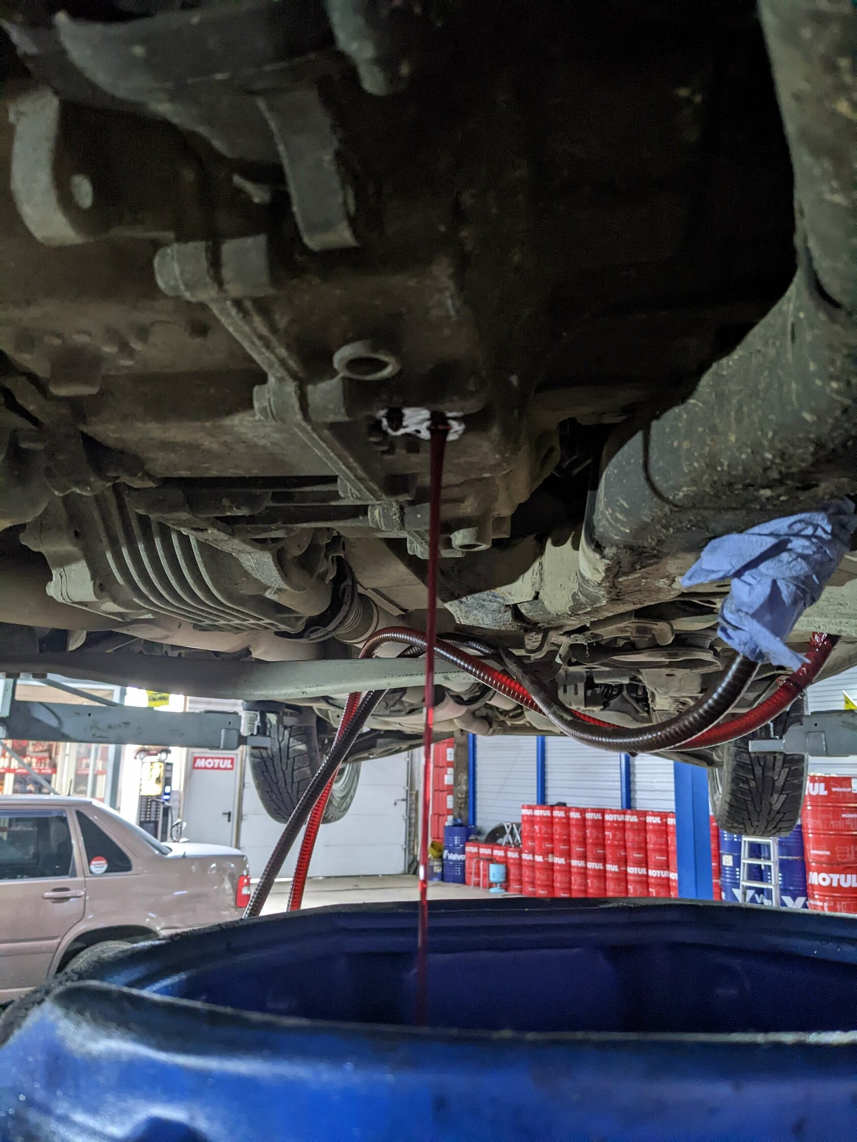 Слив масла с коробки передач GM