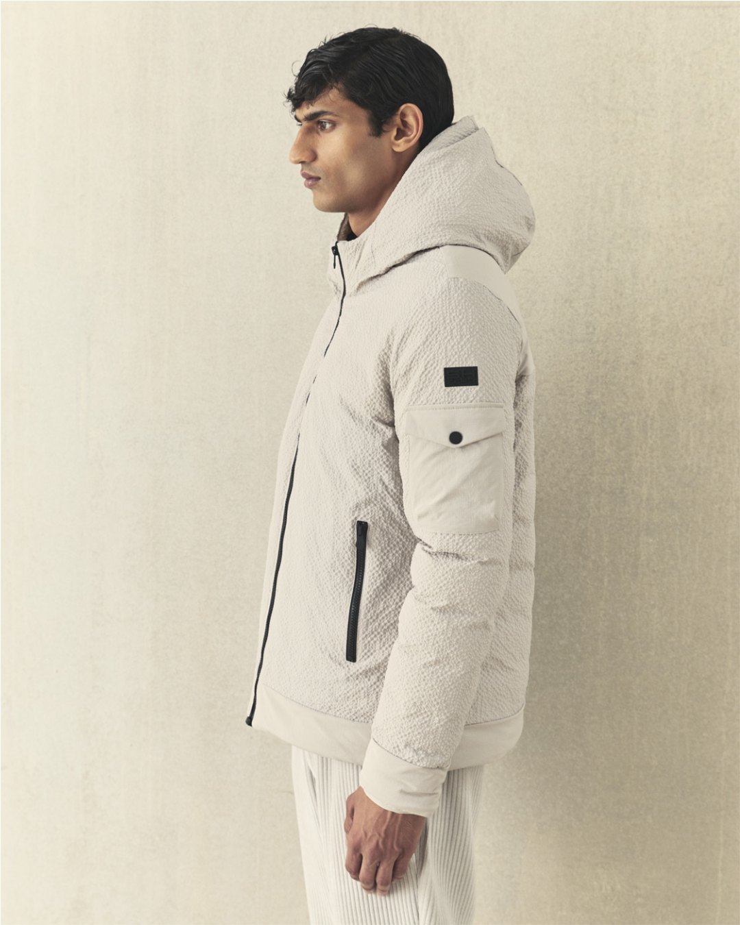 SH ZERO Autumn-Winter 2026-27: ice-coloured technical hooded down jacket