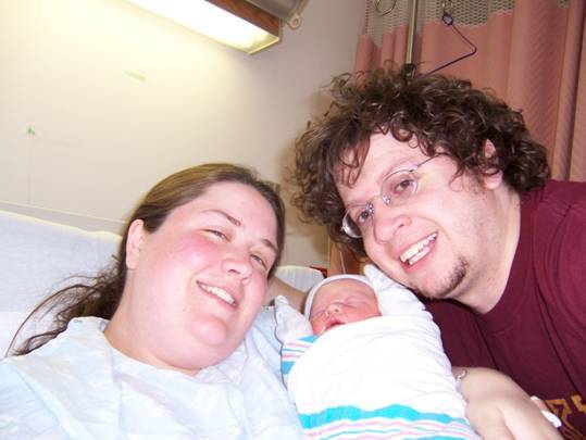 Laura and Tony with newborn Maji