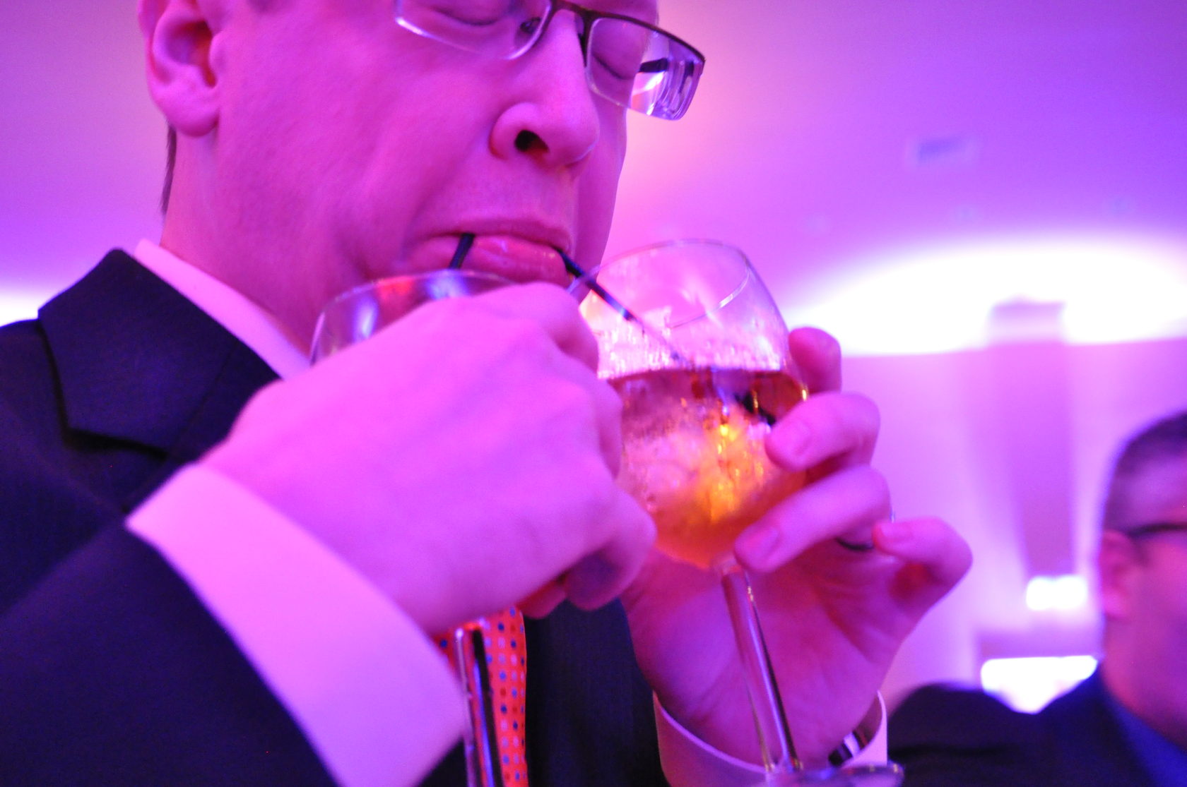 Tony double-fisting drinks at SigEp Charter Anniversary Banquet