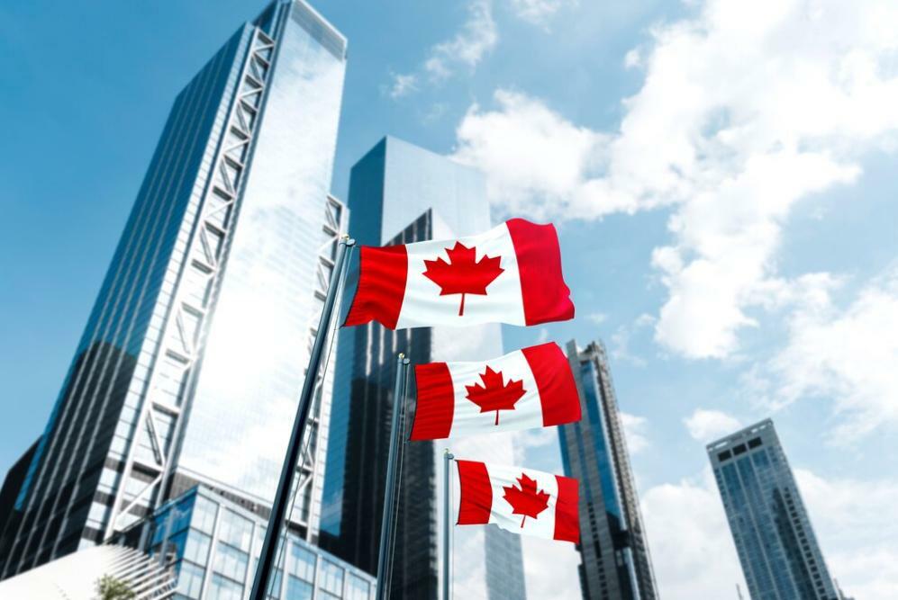 Binance Canada: Binance leaving Canada represented by a photograph of buildings with Canadian flags Freepik