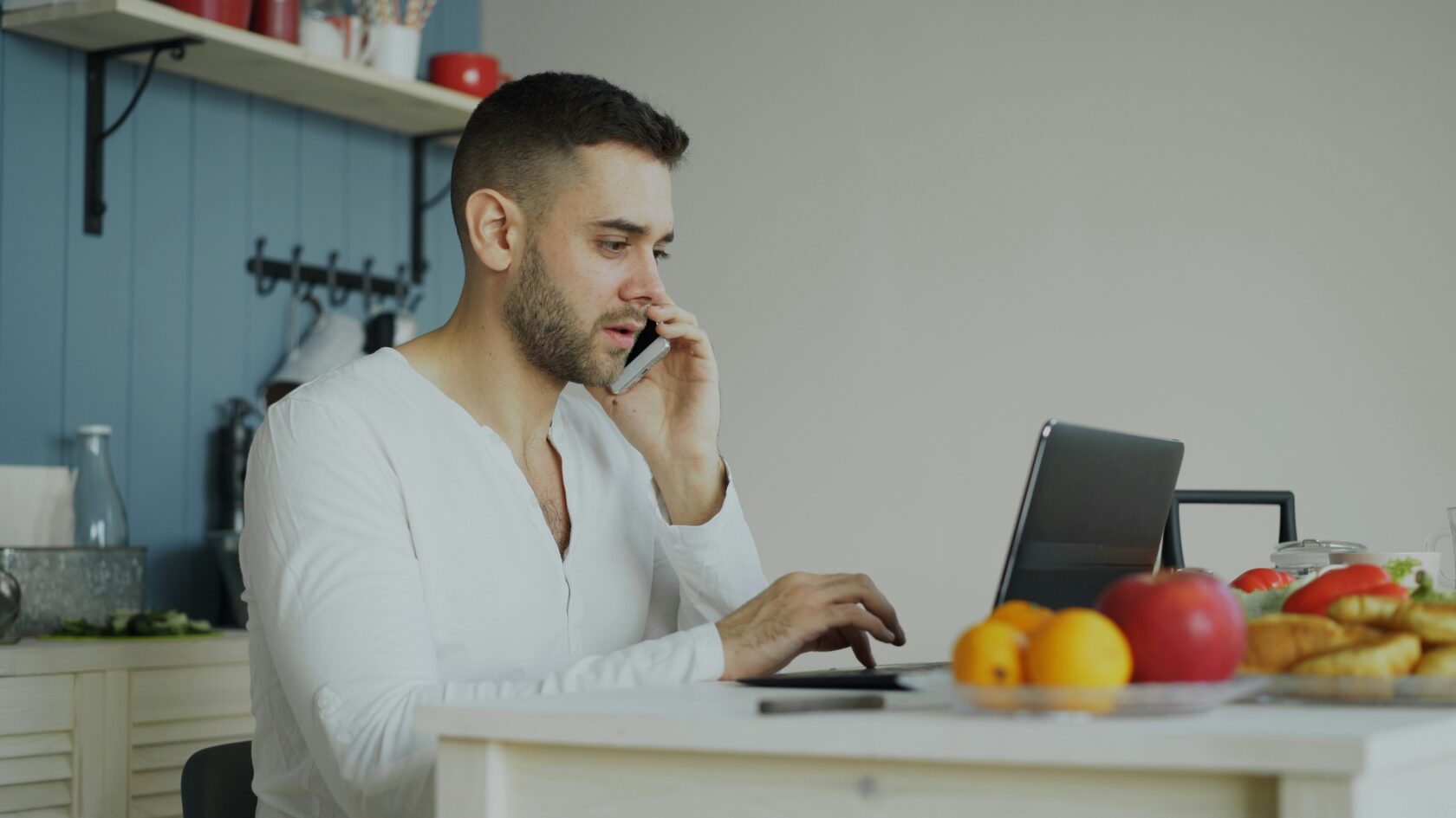 Small hospitality business owner managing multiple tasks simultaneously