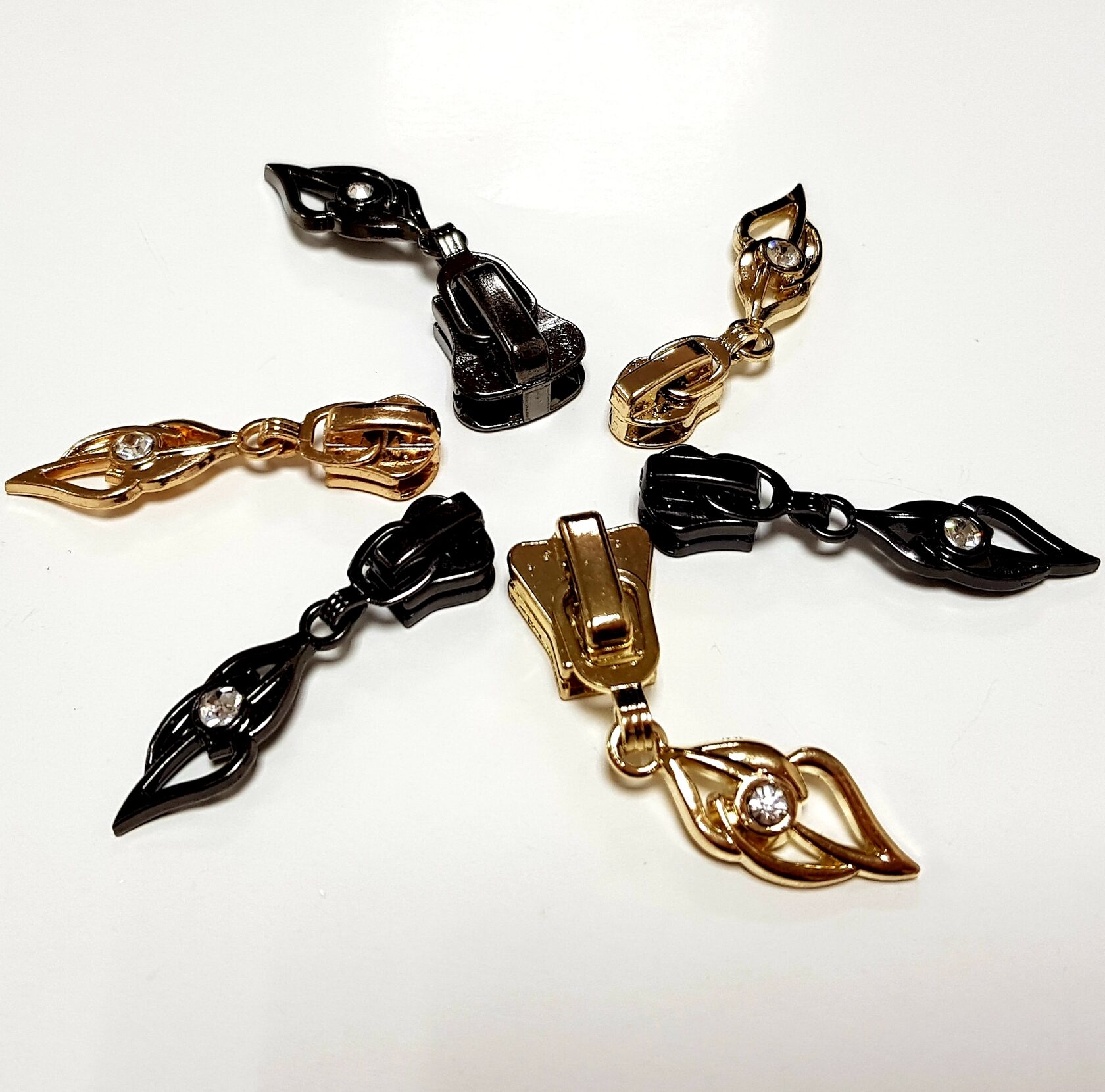 kovový stahovací běžec