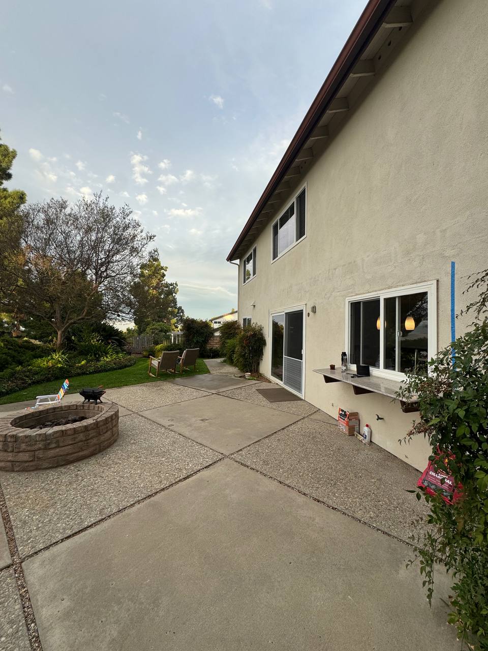 Fountain Valley backyard with an uncovered concrete patio and no pergola before installation