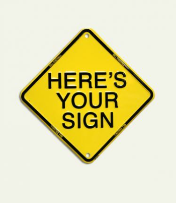 a yellow sign that says' here's your sign