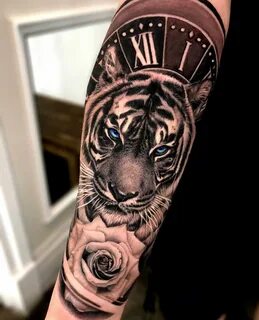 Что означает тату с тигром для девушек и мужчин на плече, руке, груди, спине или ногах