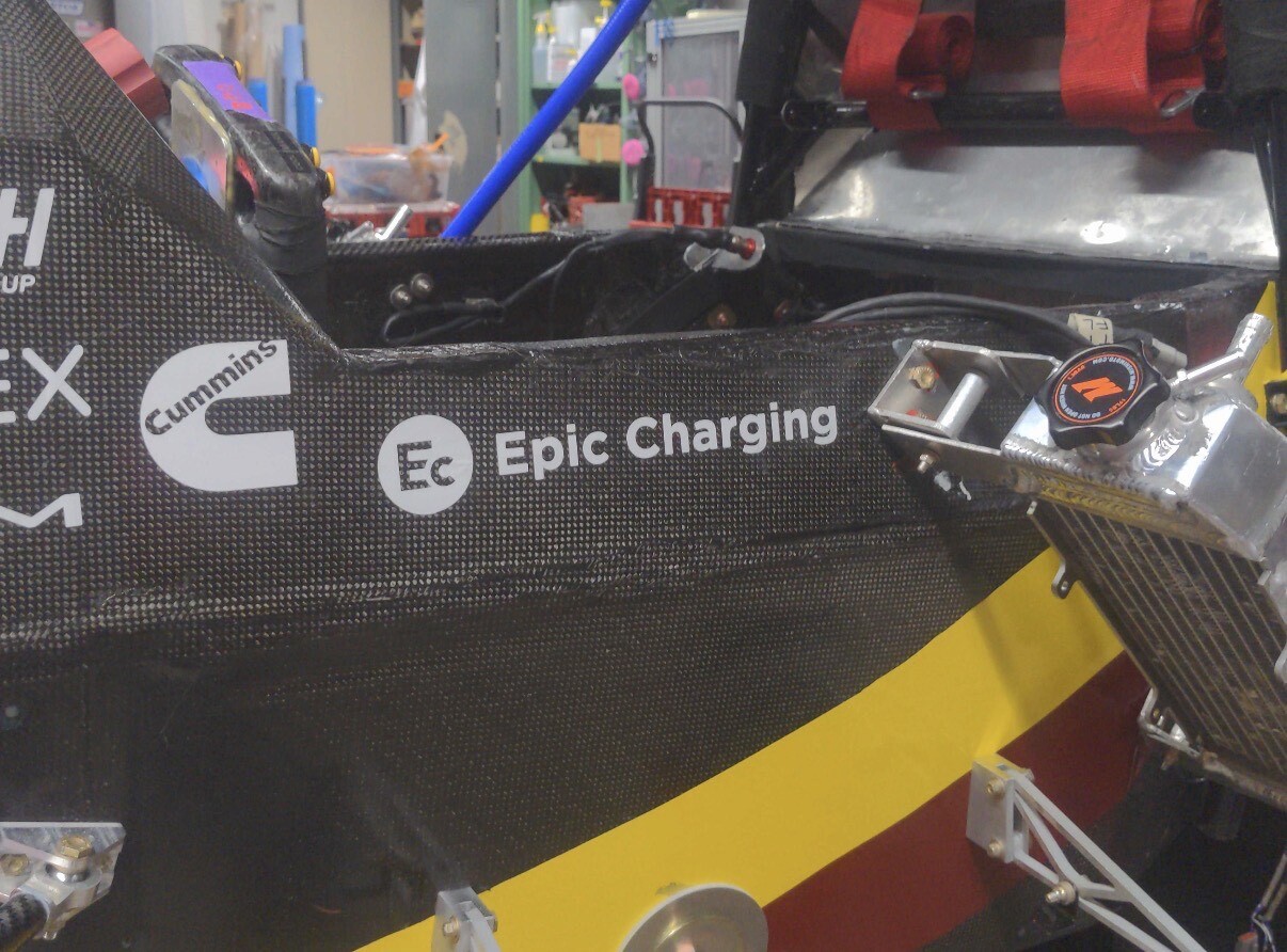 Epic Charging branding on the Gopher Motorsports Formula SAE Electric race car chassis.