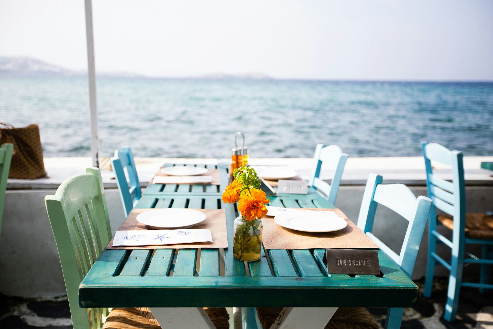 Empty reserved table in busy restaurant illustrating no-show problem