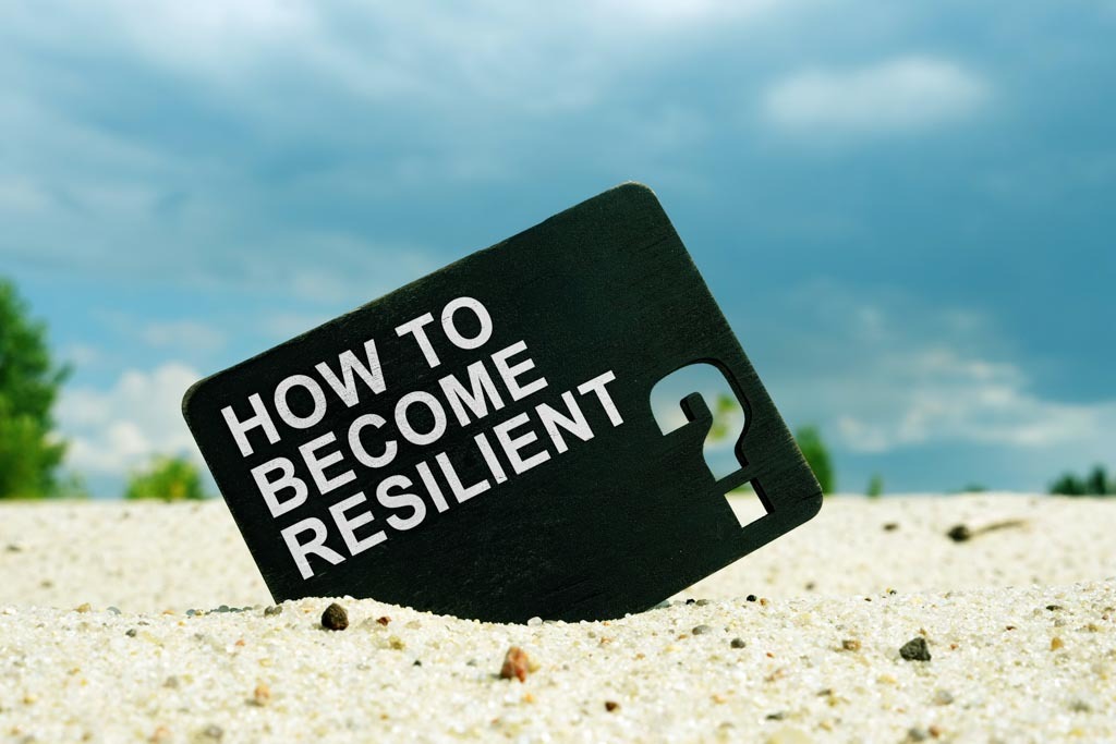 Schild mit Aufschrift: Wie werde ich resilient?