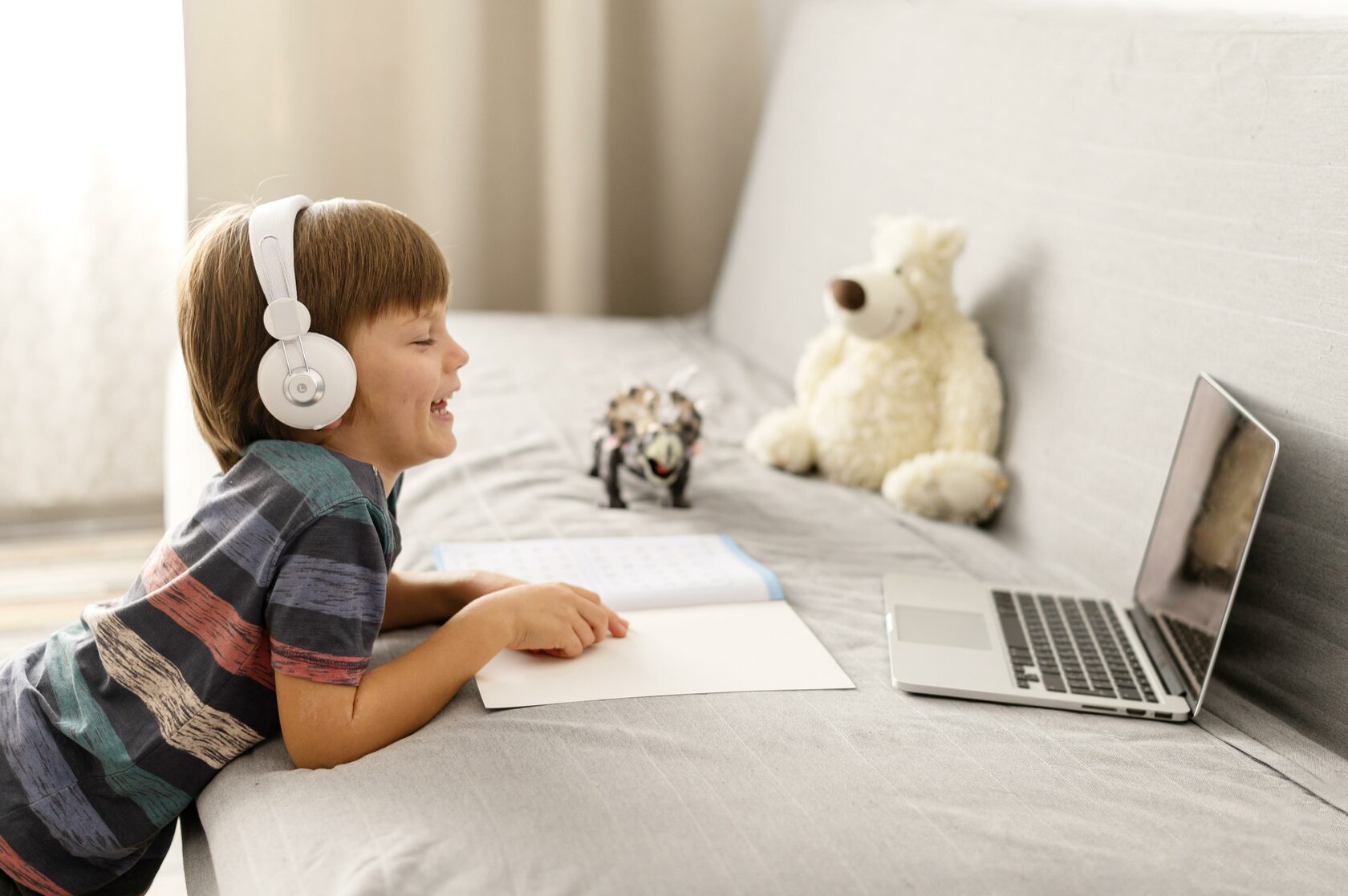Make your homework. Children wearing Headphones back.