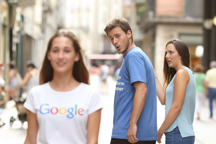 man and woman walking, he is looking at another girl walking by